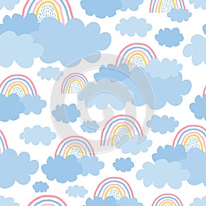 Cute, delicate seamless pattern with a rainbow, clouds on a white background in pastel color. Illustration for children