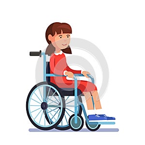 Cute disabled girl kid sitting in a wheelchair
