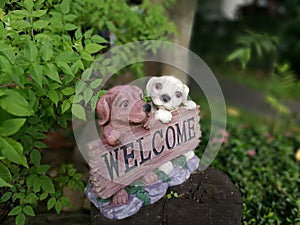 Cute dogs with WELCOME label