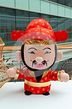 cute doll of the God of Prosperity at vertical composition