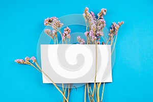 Cute dried violet statice flower with white card on top