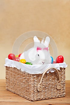 Cute easter bunny with colorful eggs
