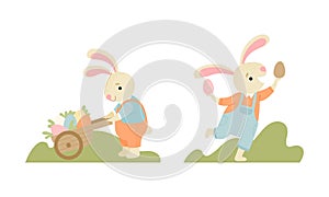 Cute Easter Bunny with Long Ears in Jumpsuit Pulling Wheelbarrow with Eggs Vector Set