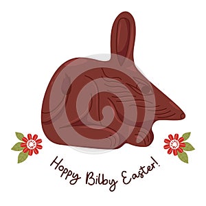 Cute Easter chocolate bilby with greeting. Vector illustration. Festive paschal Australian animal symbol.