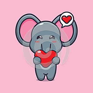 Cute elephant cartoon character holding love heart.