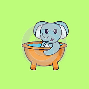 Cute elephant taking a bath in the bathtub. Animal cartoon concept isolated. Can used for t-shirt, greeting card, invitation card