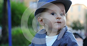 Cute eleven month old baby boy with his italian hat