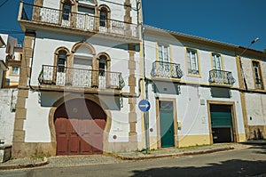 Cute facade of old house and awkward wooden door