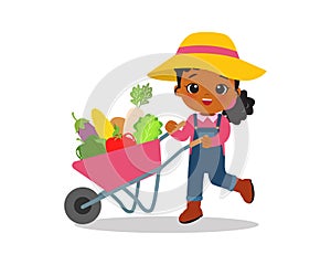 Cute farmer girl carry a cart containing vegetables