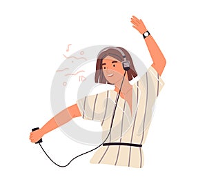 Cute female teenager listening to music in headphones and dancing vector flat illustration. Happy young woman enjoying