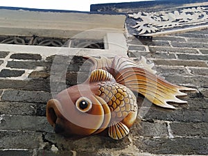 so cute fish statue in old Chinese building Tang kwong u ancestral hall kam tin hongkong