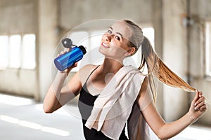 Cute Fitness Girl Resting And Drinking Water