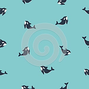 Cute flat killer whale seamless pattern. Adorable little cartoon orca vector illustration. Childish ornament for textile, fabric,