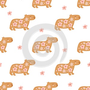 Cute floral capybara animal seamless pattern. Vector summer repeat background with cute animal.