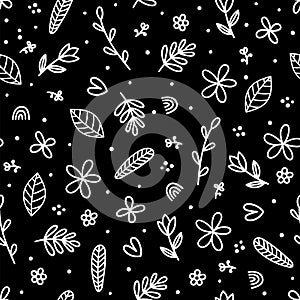 Cute floral seamless pattern with hand drawn elements on black background. Scandinavian style. Doodle flowers