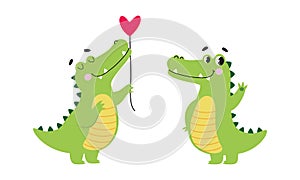 Cute friendly green crocodiles set. Lovely baby alligators cartoon vector illustration