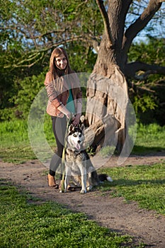 Cute and friendly photo of girl and her dog