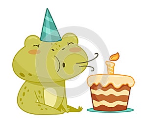 Cute frog in party hat blowing candle on birthday cake. Green funny amphibian toad character cartoon vector illustration