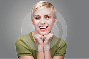 Cute fun bubbly adorable personality modern young fresh pixie haircut perfect teeth smile photo