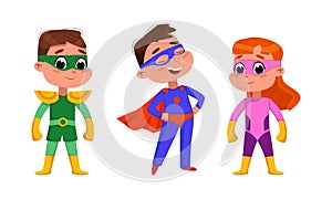 Cute funny kids superheroes set. Boy and girl wearing colorful comics costumes cartoon vector illustration