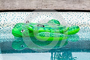 Cute Giant Green Turtle Inflatable Poolfloat in the Swimming Pool