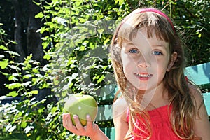 Cute girl with apple