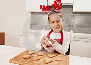 Cute girl baking in the kitchen