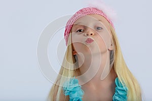 Cute girl blowing kiss