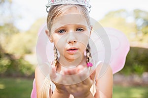 Cute girl blowing kisses