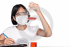 Cute girl doing science experiment