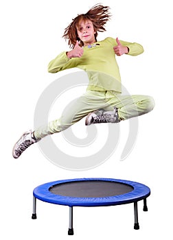 Cute girl exercising and jumping on a trampoline