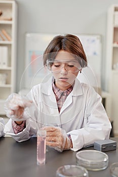 Cute Girl Experimenting in Chemical Lab