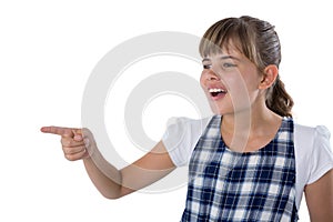 Cute girl gesturing against white background