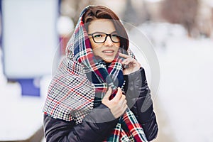 cute girl in glasses and a scarf