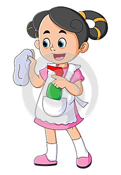 The cute girl is going to clean with a spray and mop while wearing an apron