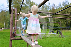 Cute girl having fun at playground