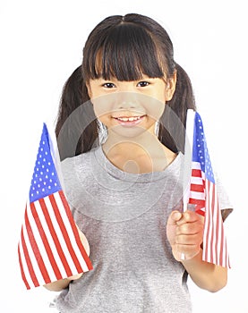 Cute girl holding an American Flag