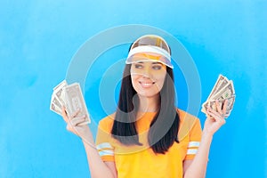 Cute Girl Holding Her Money Savings in Dollar Banknotes