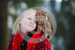 Cute girl with little owl