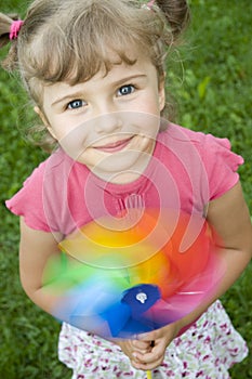 Cute girl with little windmill