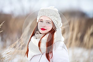 Cute girl outdoors on a sunny winter day.