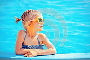 Cute girl in pool