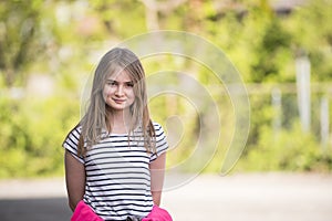 Cute girl posing outdoor.
