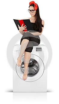 Cute Girl Reading a Book on a Washing machine
