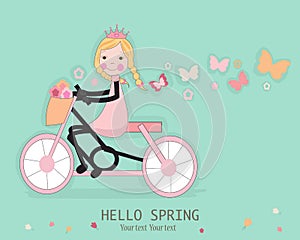 Cute girl riding a bicyle with spring flower and butterflies
