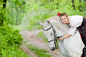 Cute girl riding horse