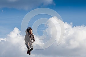 Cute girl running jumping