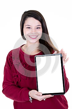 Cute girl showing a blank pc tablet computer screen isolated