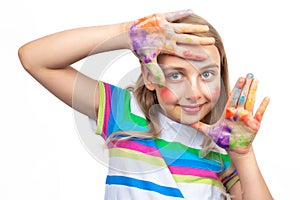 Cute girl showing hands painted in bright colors isolated on white