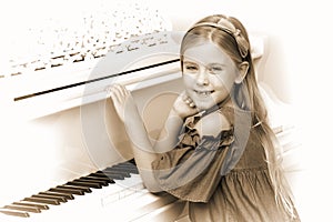 Cute girl sitting at grand piano at music lesson
